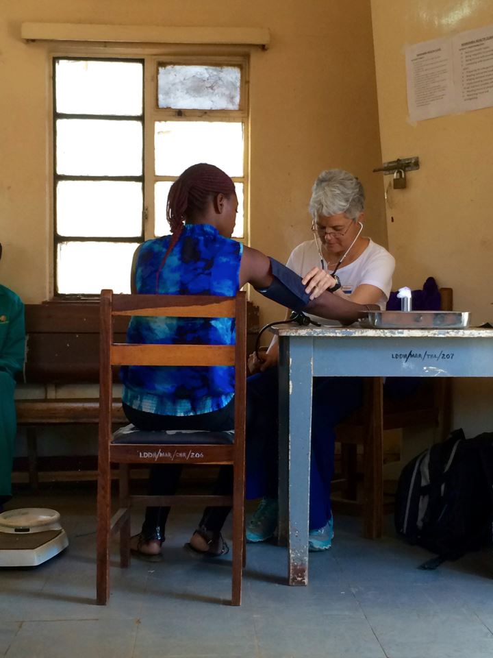 Professor Brinks working in a clinic in Zambia