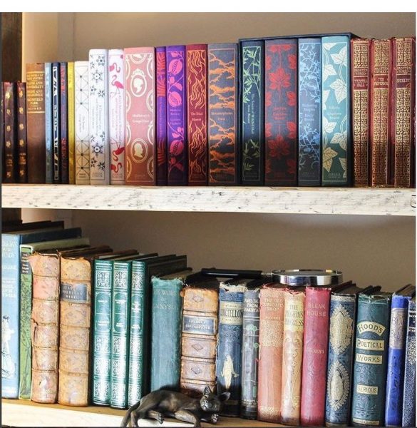 Colorful books on a bookshelf.