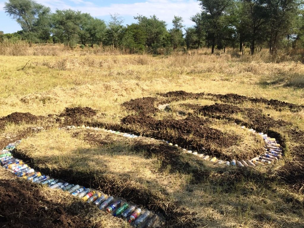 Ecobricking to create a compost bin.