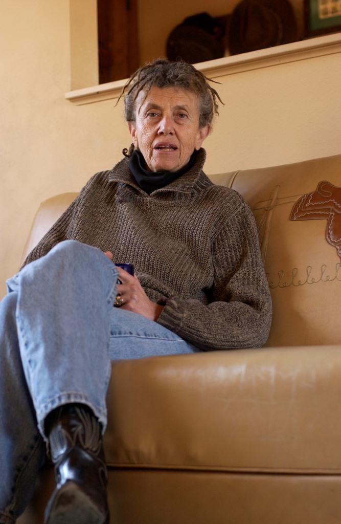 Leslee Becker talks in her living room, January 25, 2003.