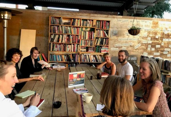 Lynn Shutters and Kelly Weber (top left) discuss Beloved with a group of interested readers