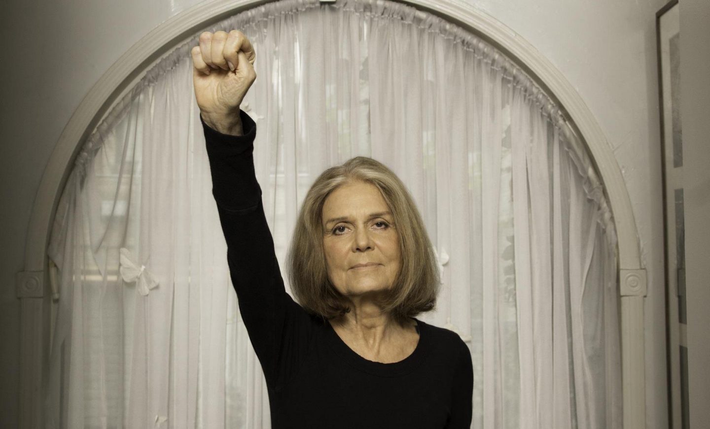 Gloria Steinem fist raised