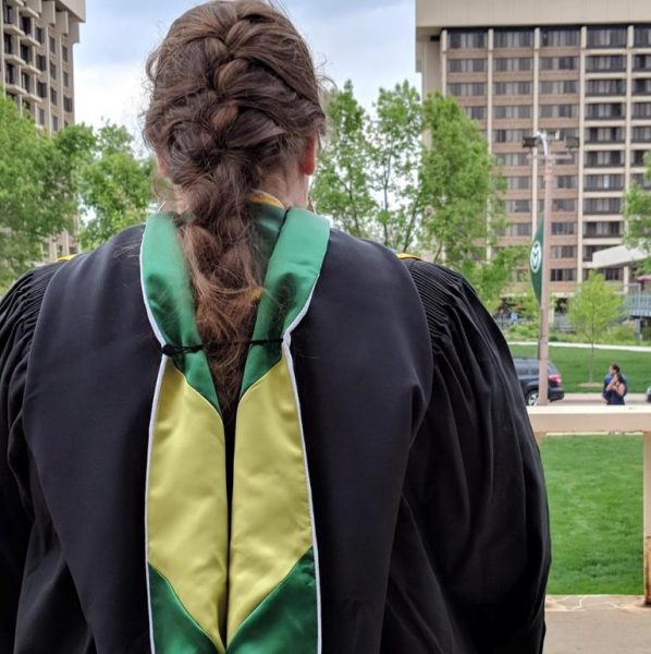 Picture of Katie Haggstrom in her graduation robes