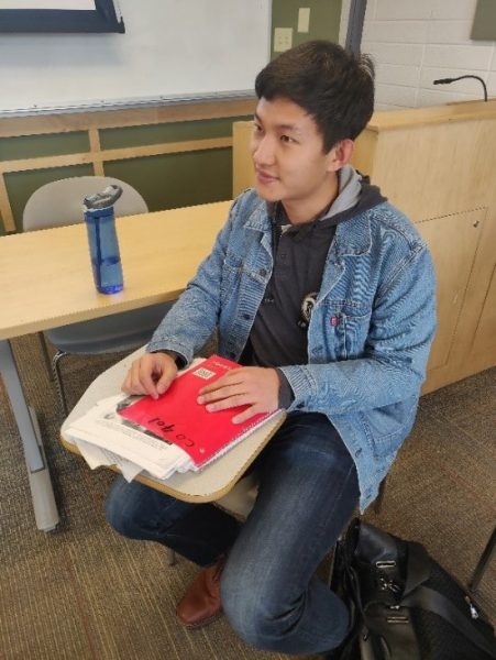 Frank sitting in class