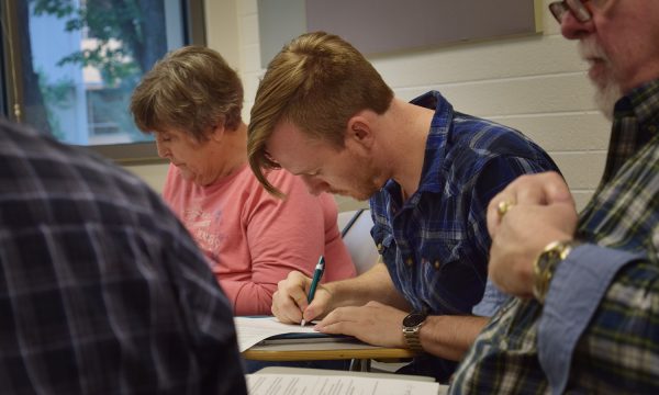 Ross Atkinson writing in workshop