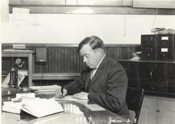Alfred Westfall at his desk
