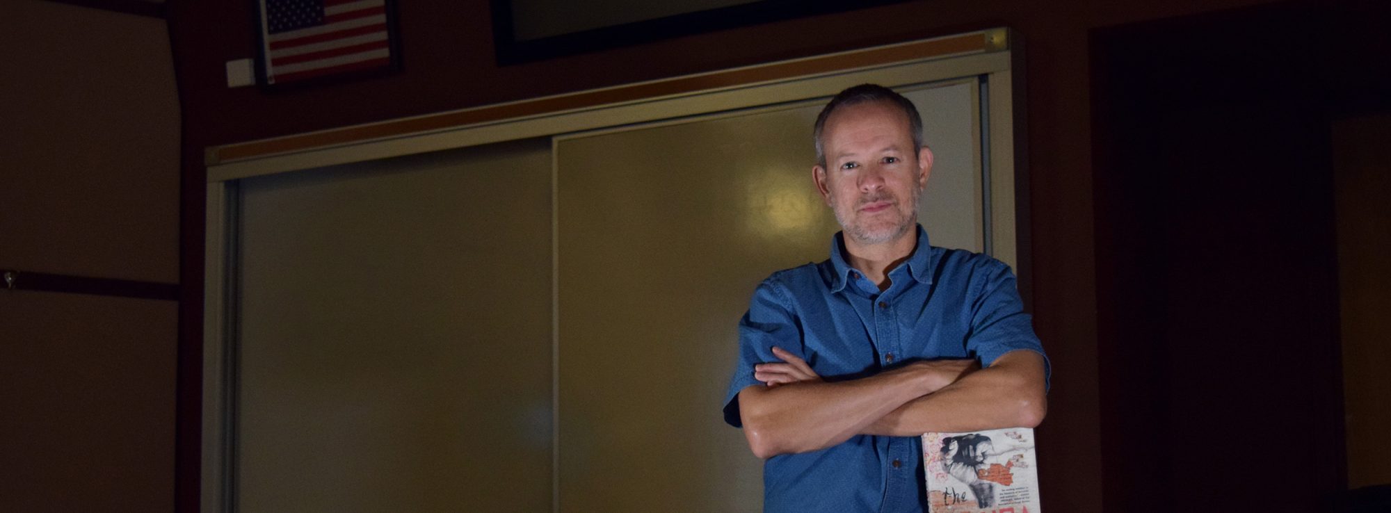 Andrew Altschul with his book The Gringa