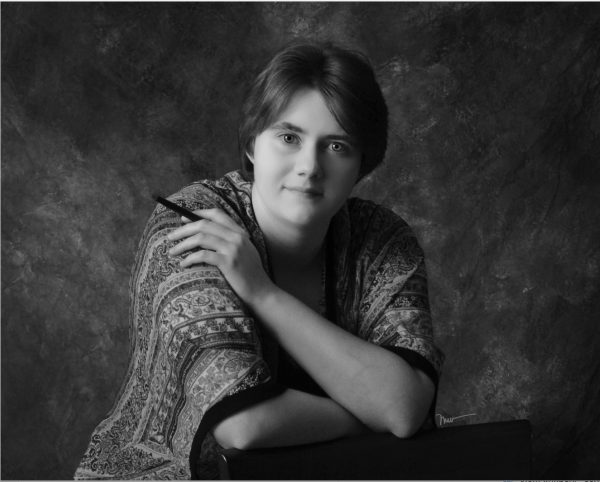 Black and white author photo of Kelly Weber.
