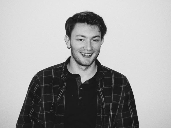 Black and white author photo of Kobe Overby