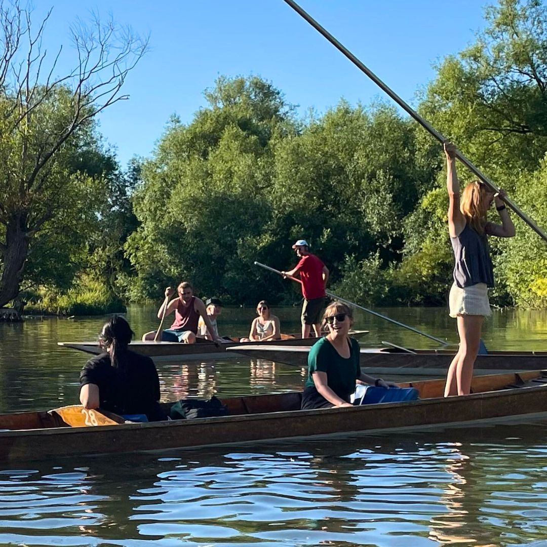 Summer in Oxford students punting along the river.